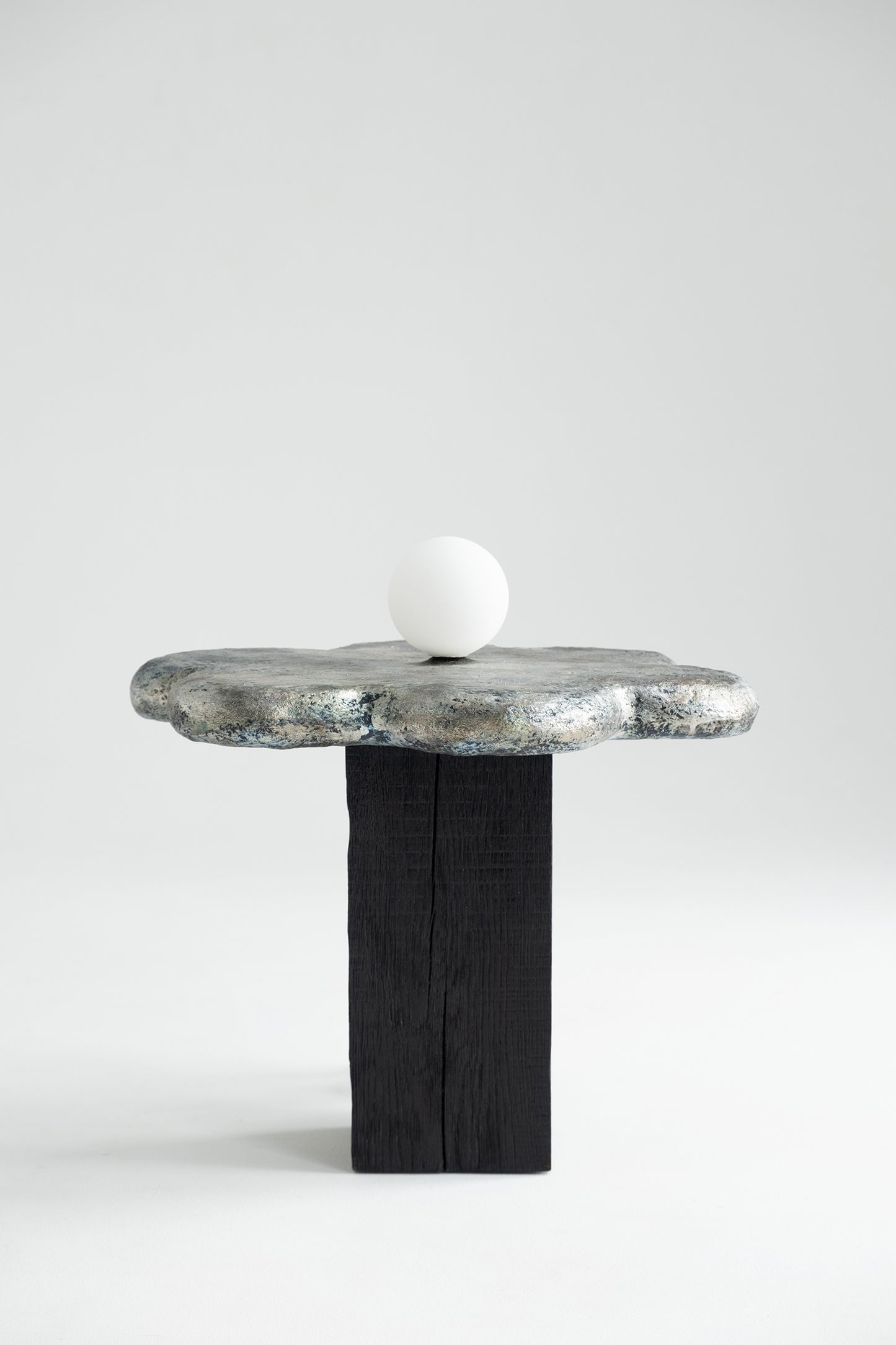 Kvit — Sculptural Coffee Table with Integrated Light