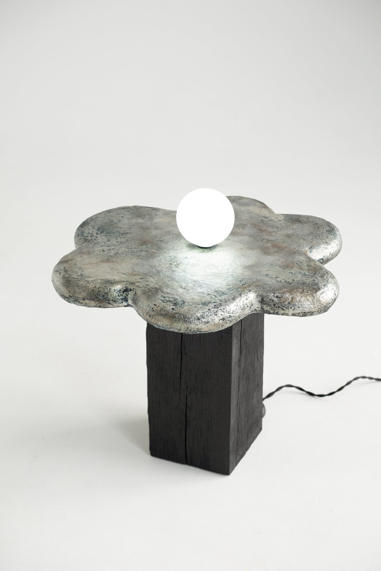 Kvit — Sculptural Coffee Table with Integrated Light