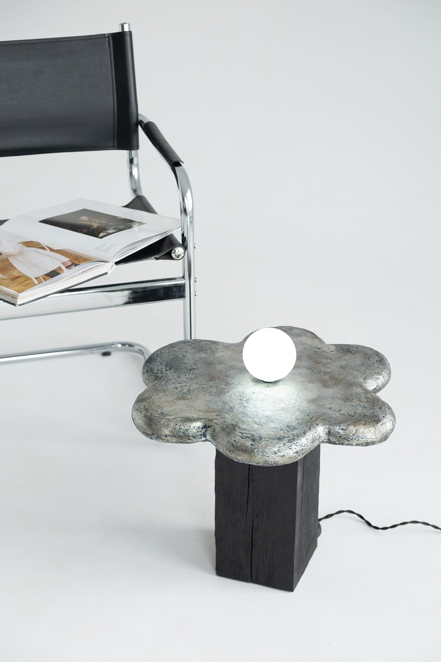 Kvit — Sculptural Coffee Table with Integrated Light